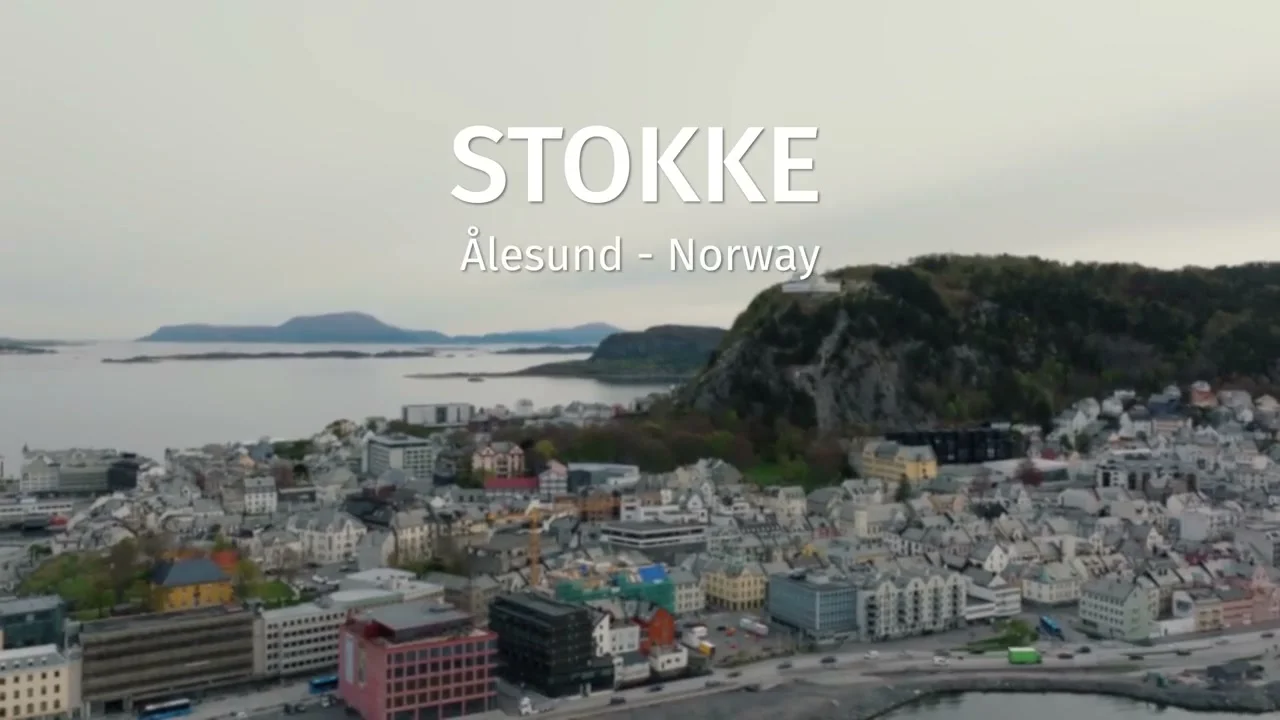 Participants on the bleacher seating with laptops during an AI training session by Copilot Academy at Stokke